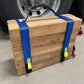 Wooden crate secured with blue cribbing strap Long-FFCS12 and yellow buckles