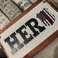 Wooden sign with HERO and red line flag badge for Fire Hose Sign display