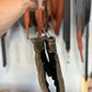Worn brown leather work gloves for first responders and firefighters with quick release GLOVE STRAP DUAL CLIP NO.2