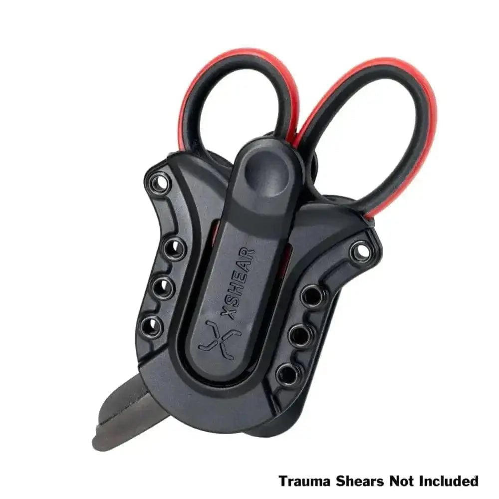 Black plastic XShear Tactical Holster with red trim for trauma shears