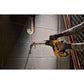 Yellow and black DeWalt DCH072B Xtreme 12V MAX Brushless Cordless Rotary Hammer drilling concrete