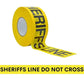 Yellow barricade flagging tape with black text for safety in construction zones BRC