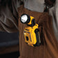 Yellow DeWalt DCL510 12V MAX LED Work Light with battery pack, hand held design