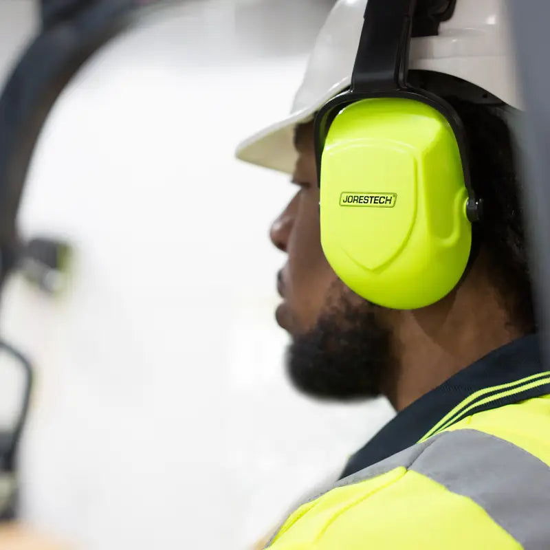 Yellow hearing protection earmuffs for slotted hard hats, featuring 23dB NRR noise cancelling