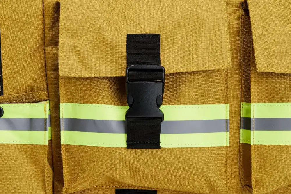 Yellow firefighter gear with reflective stripes on Elite Firefighter Gear Bag