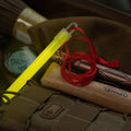 Yellow glow stick from M-Tac Glow Sticks 6’’ set of 5 for outdoor adventures