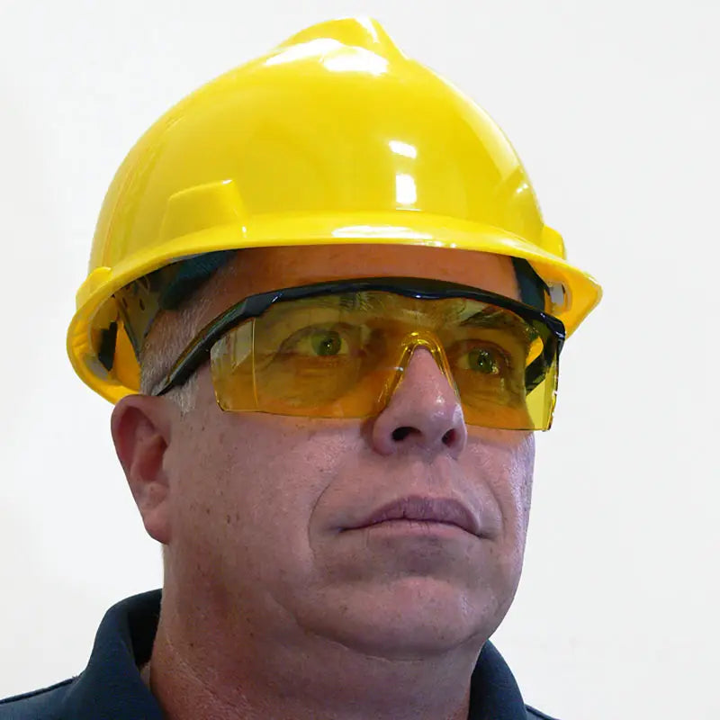 Yellow hard hat and framed rectangular safety glasses for high impact protection ANSI Z87+