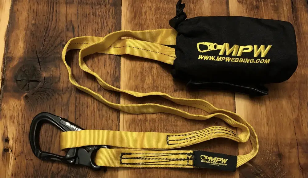 Yellow webbing lanyard with black carabiner and storage pouch for personal carry and fireground use