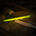 Glowing yellow M-Tac Glow Sticks 6’’ for outdoor safety and fun activities