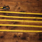 Yellow tow strap with black carabiner for personal carry and fireground applications
